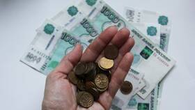Почему предпочитают наличные деньги в Аксон